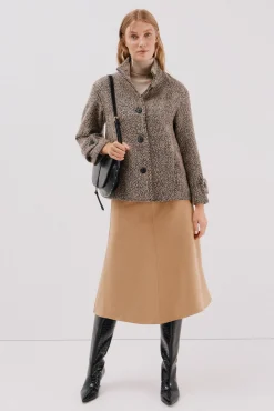 Abrigo corto tejido estructura