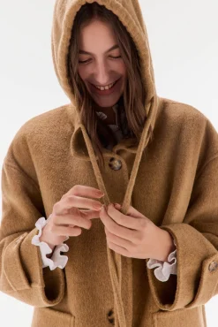 Abrigo de doble faz con capucha