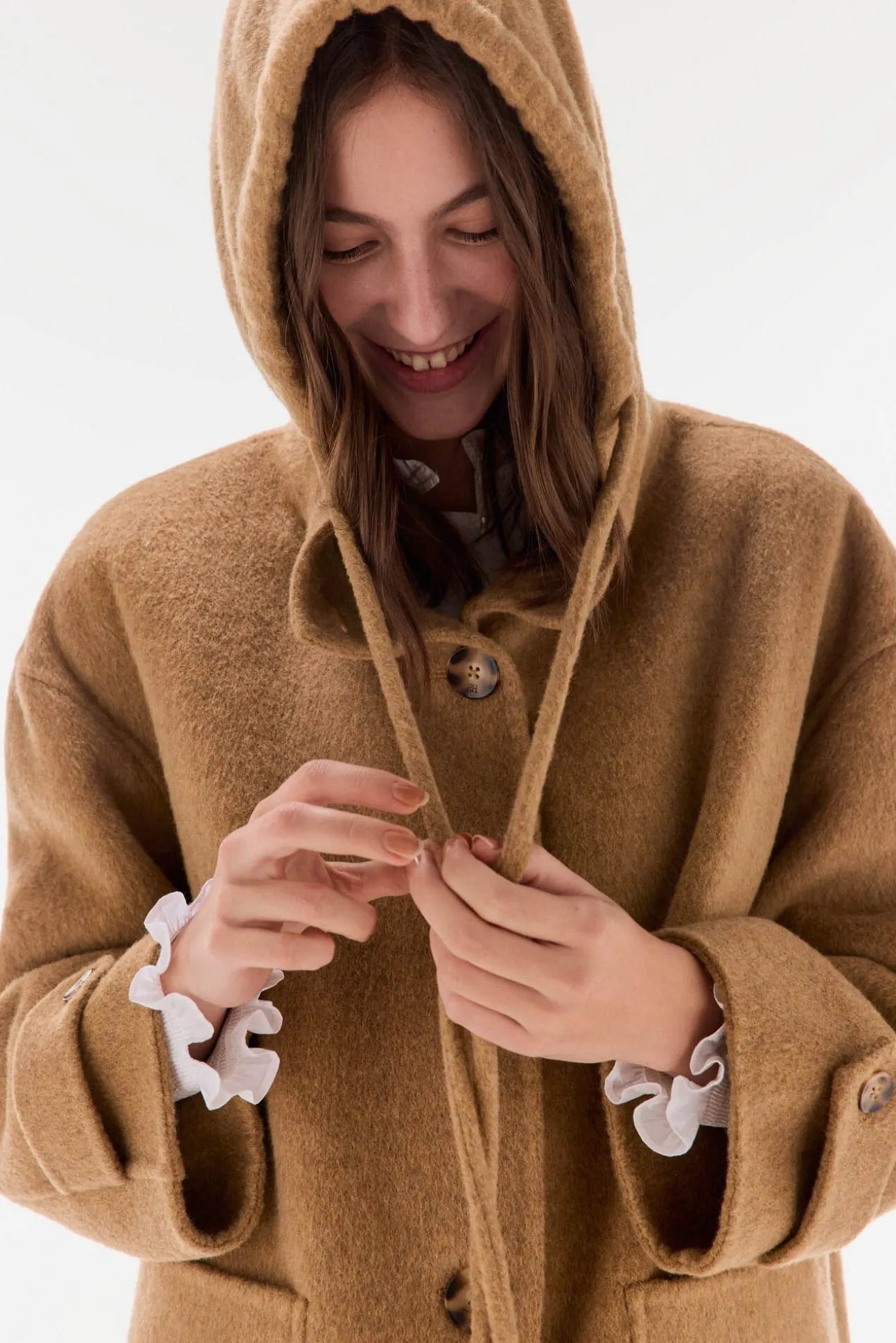 Abrigo de doble faz con capucha