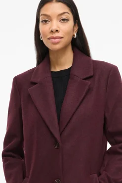 Abrigo de paño con solapas