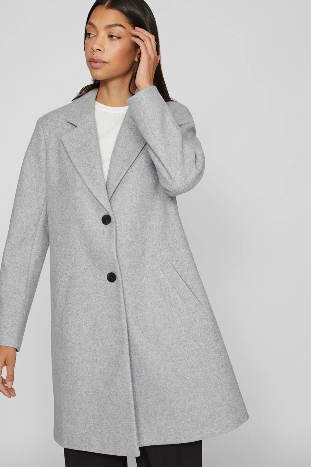 Abrigo de paño con solapas