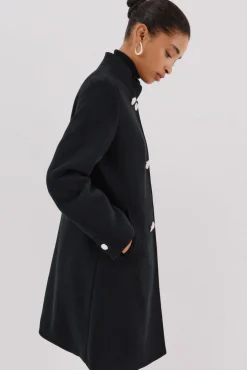 Abrigo doble cruce botón dorado