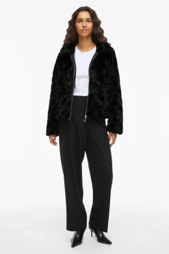 Abrigo efecto pelo con cremallera