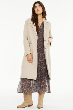 Abrigo largo bolsillos