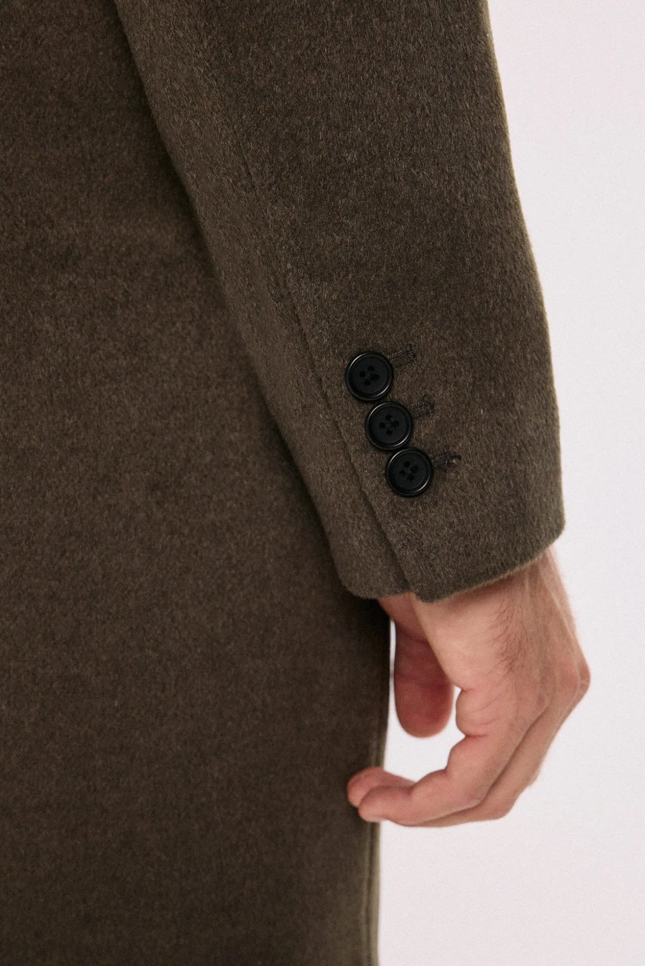 Abrigo largo con cierre combinado