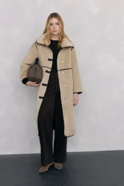 Abrigo reversible de efecto pelo