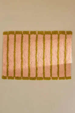 Alfombra de baño a rayas rosas Saturno