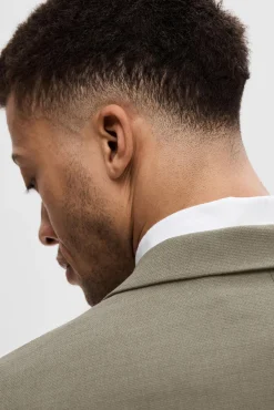 Americana de traje Slim Fit confeccionada con lana.