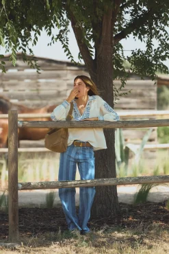 Blanca. Vaqueros a rayas