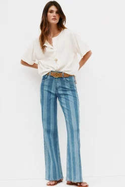 Blanca. Vaqueros a rayas