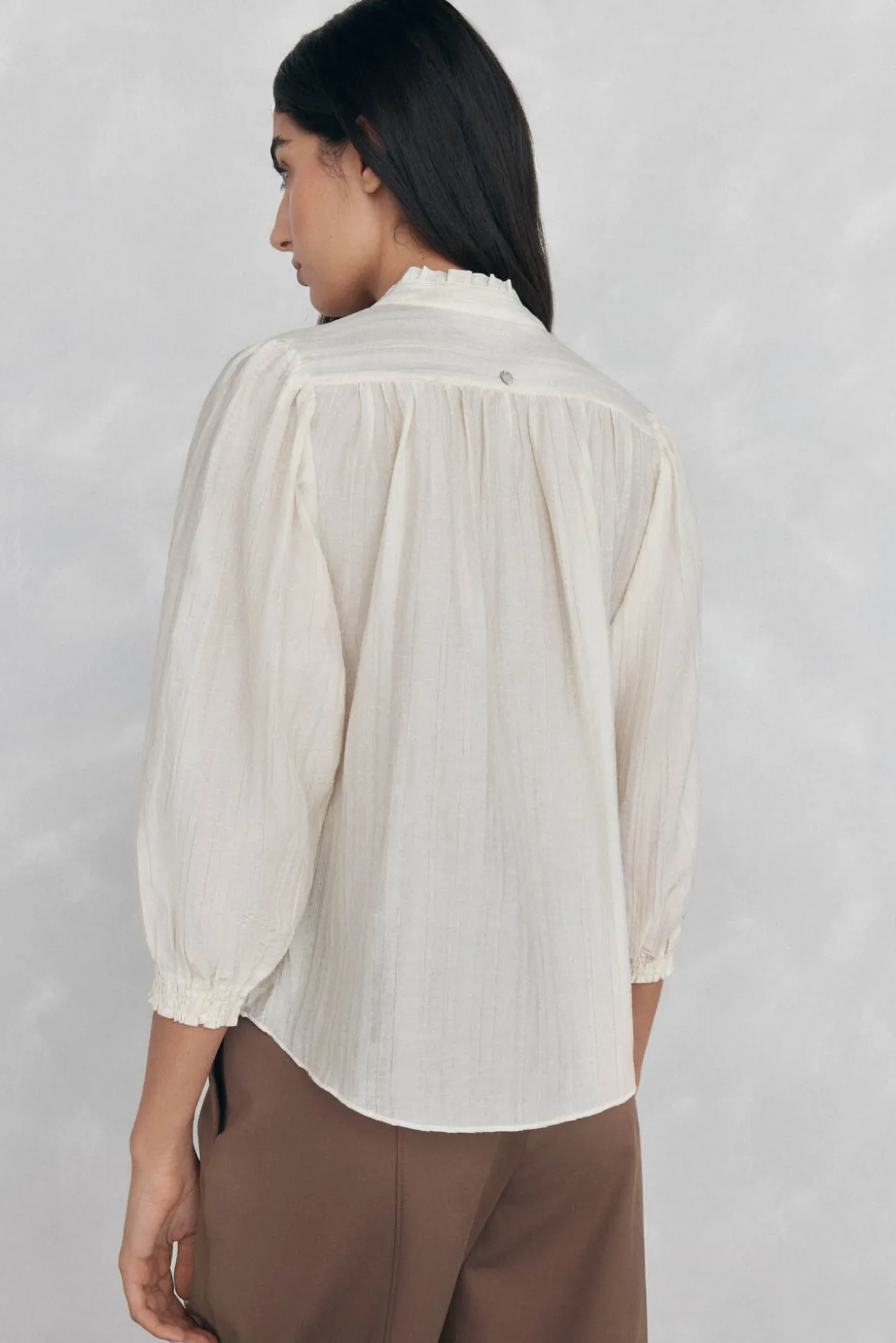Blusa amplia lisa