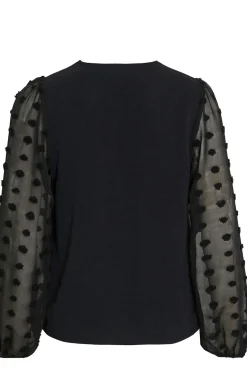 Blusa con plumeti en mangas