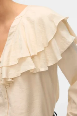 Blusa cuello de volantes