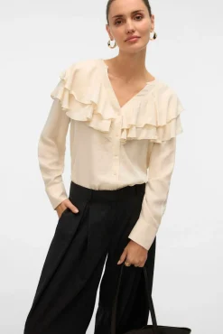 Blusa cuello de volantes