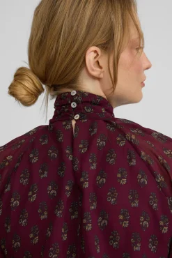 Blusa cuello estampado motivos