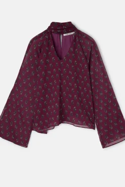 Blusa cuello estampado motivos