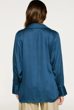 Blusa cuello pico detalle metálico