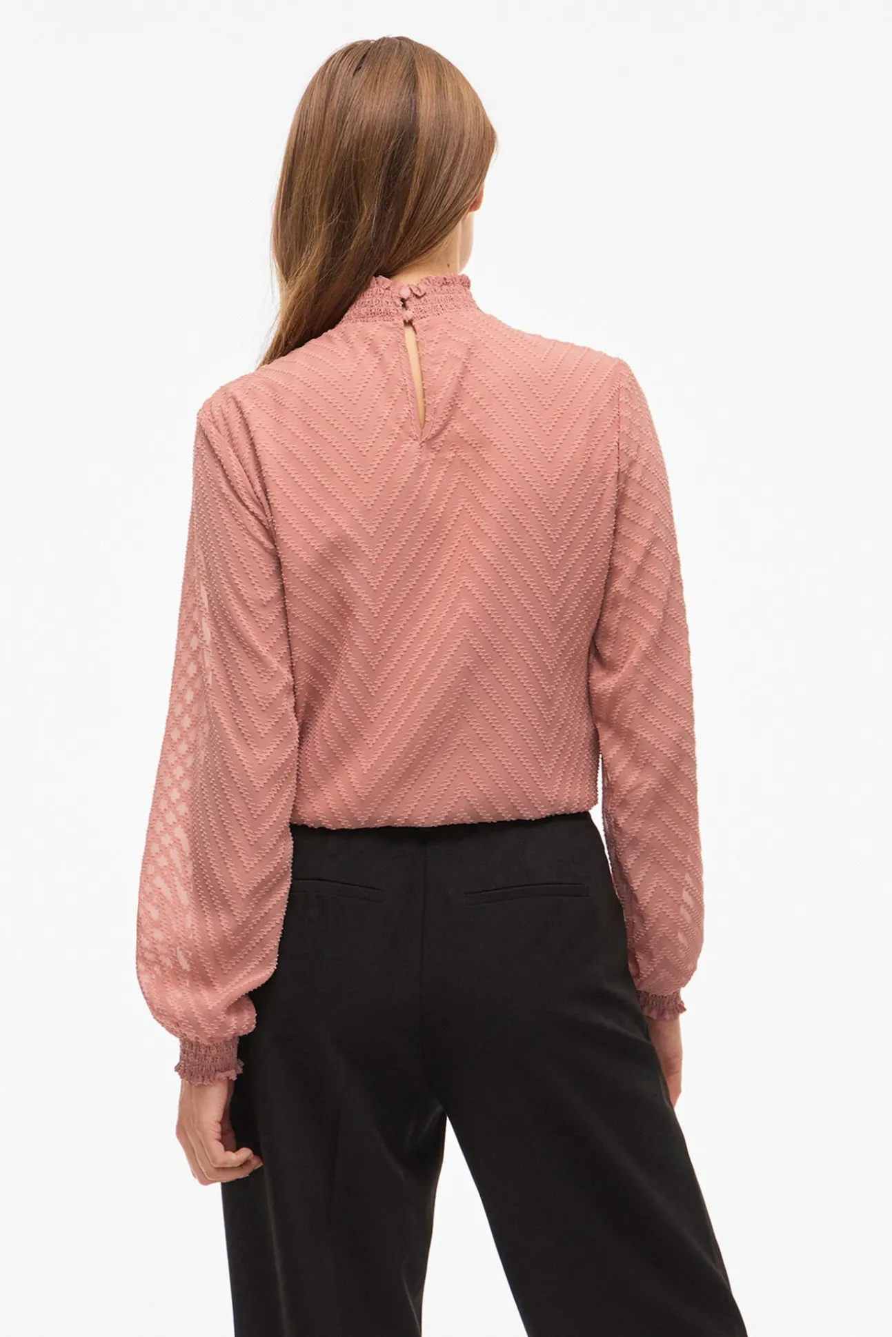 Blusa de manga larga con cuello alto