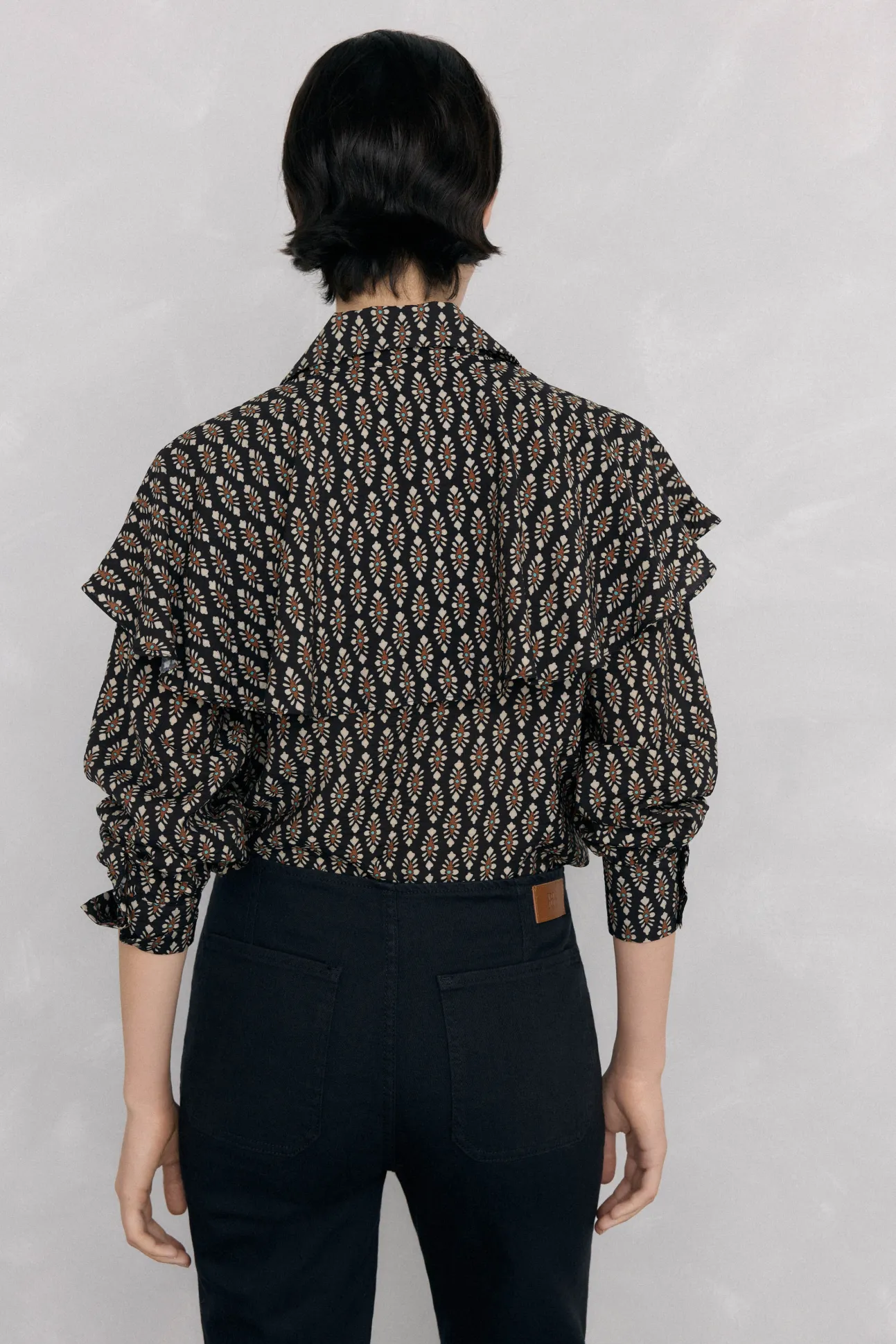 Blusa estampada capa