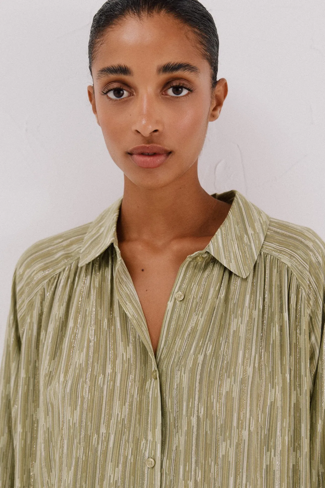 Blusa fluida estampada lurex