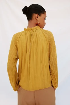 Blusa frunces fluida