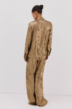 Blusa lazo efecto dorado