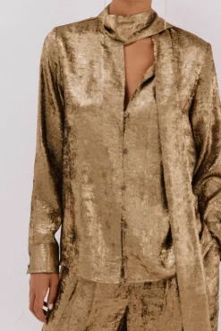 Blusa lazo efecto dorado