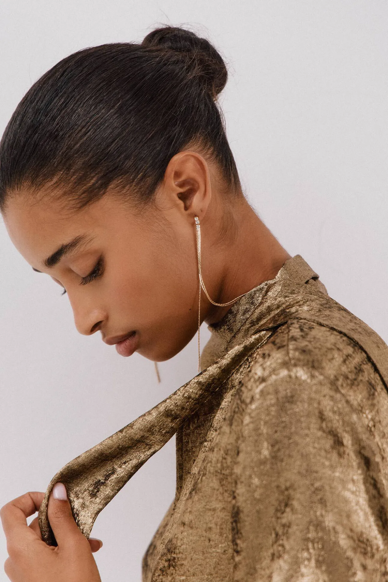 Blusa lazo efecto dorado