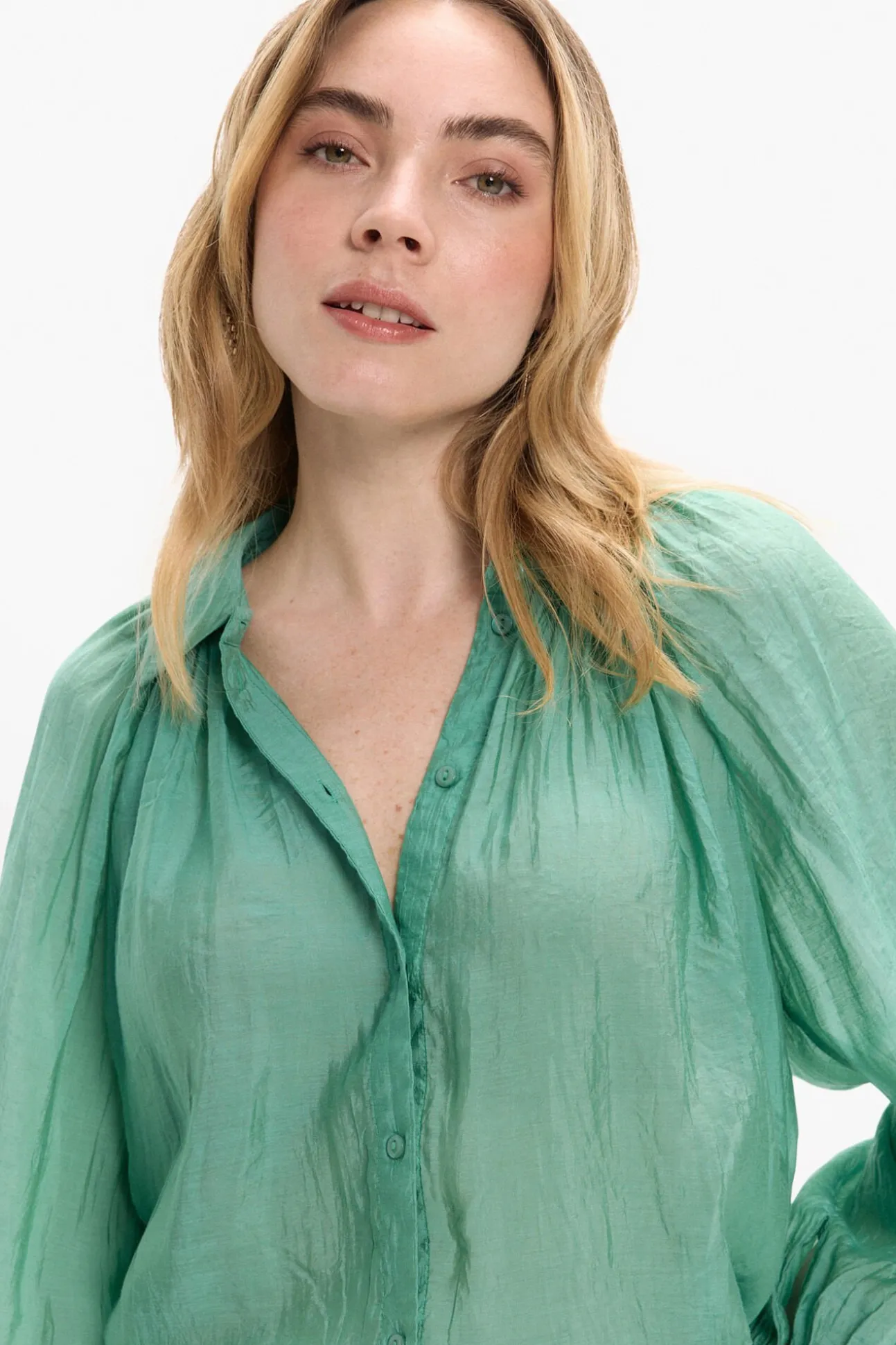 Blusa manga larga abullonada