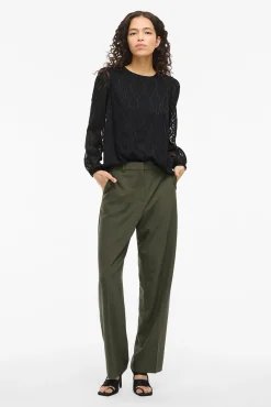 Blusa manga larga con cuello redondo