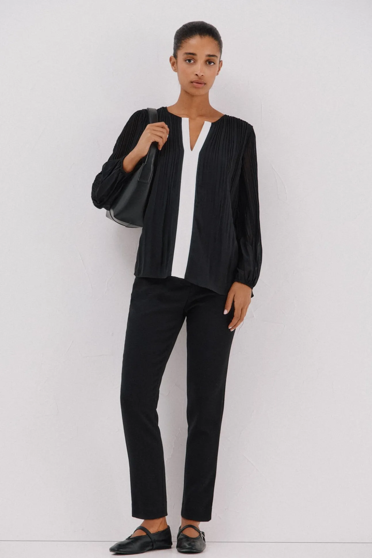 Blusa plisada contraste