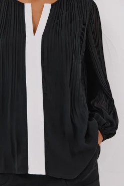 Blusa plisada contraste