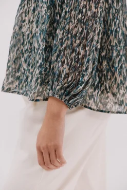 Blusa plisada contraste