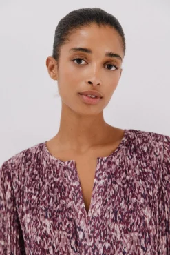 Blusa plisada contraste