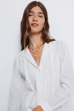 Blusa romántica schiffly