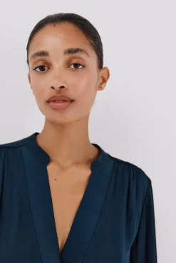 Blusa satinada fluida