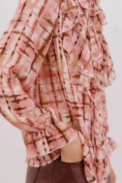 Blusa volante delantero