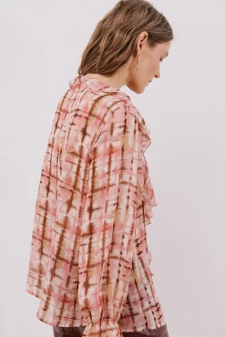 Blusa volante delantero