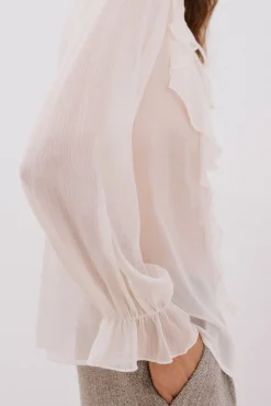 Blusa volante delantero