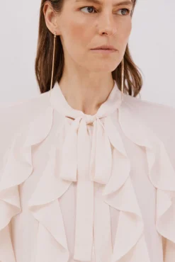 Blusa volante delantero