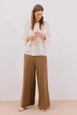 Blusa volante delantero