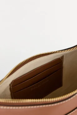 Bolso bandolera ovalado de piel