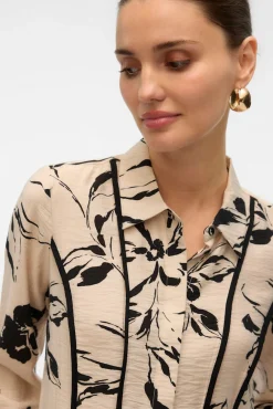 Camisa de manga larga con lineas bordadas