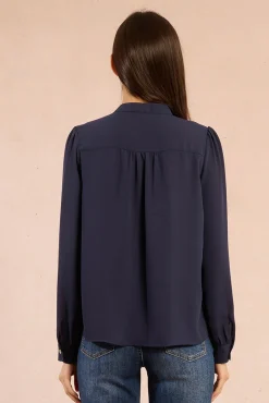 Camisa de manga larga detalle volantes