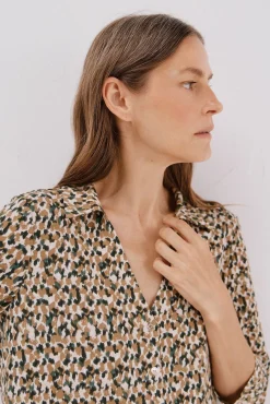 Camisa elástica botones