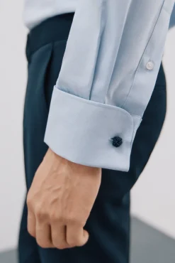 Camisa gemelos lisa fácil plancha