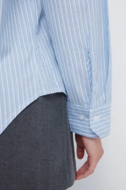 Camisa oversized bolsillo parche