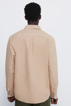 Camisa oxford tinte en prenda