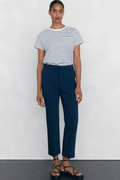 Camiseta bolsillo cadena