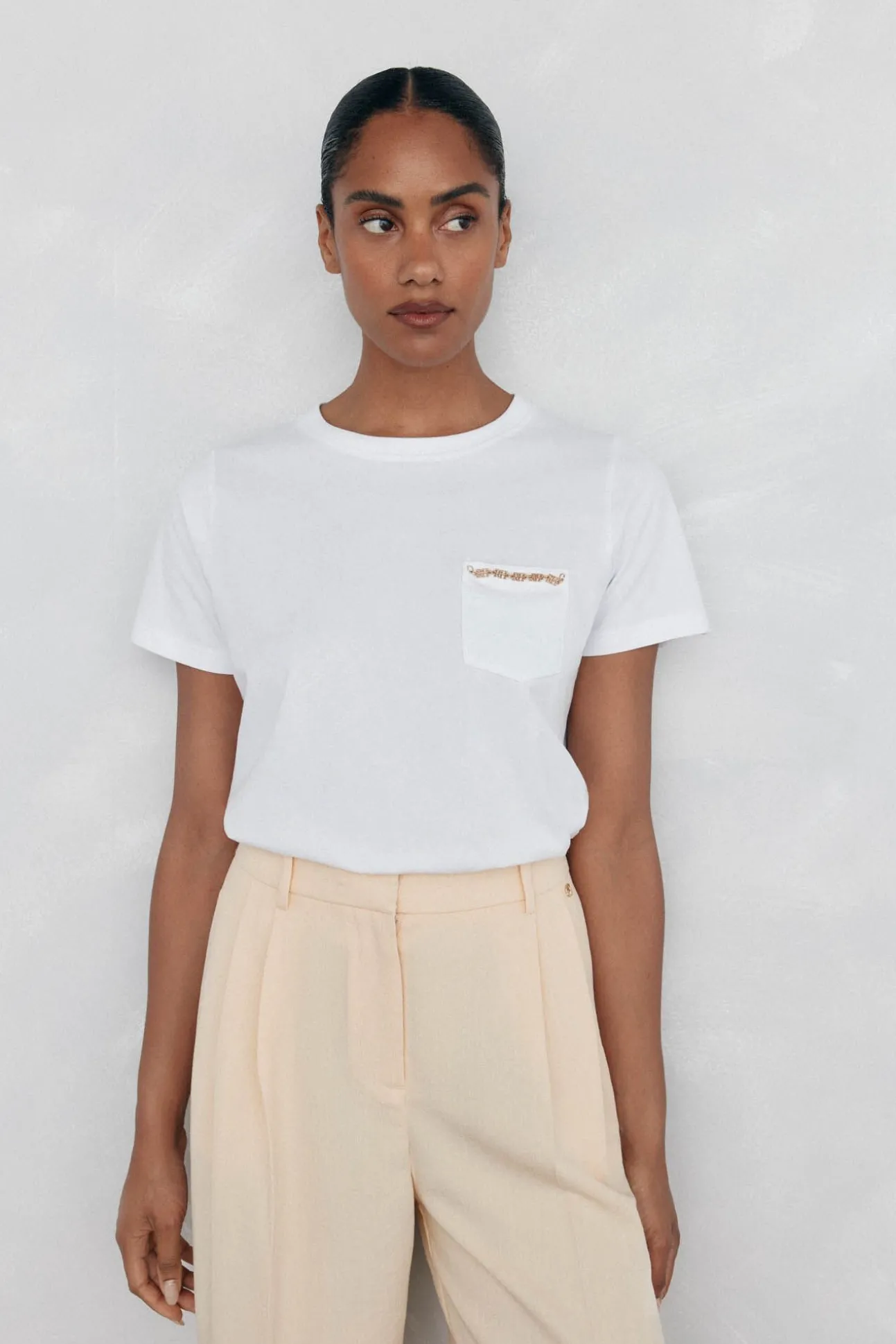 Camiseta bolsillo cadena